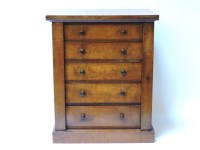 Lot 564 - A Victorian table cabinet of five graduated drawers