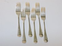 Lot 85 - A matched set of six Georgian silver table forks
