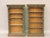 Lot 497 - A pair of Victorian carved oak open bookcases