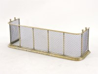 Lot 561 - A Victorian brass and wire fender