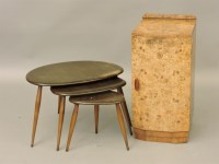 Lot 529 - An Ercol nest of three 'pebble' tables