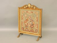 Lot 500 - A gilt and walnut firescreen