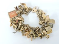 Lot 27 - A 9ct gold charm bracelet