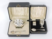 Lot 129 - A cased silver porringer and spoon