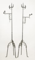 Lot 453 - A pair of wrought iron 'Heraldic' standard lamps