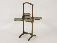 Lot 355 - A 1920s oak 'monoplane' cake stand