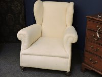 Lot 523 - A late 19th/early 20th century Howard style armchair