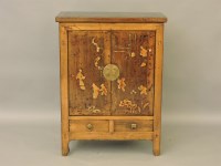 Lot 521 - A Chinese elm and lacquered cupboard