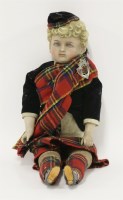 Lot 162 - A late 19th/early 20th century bisque headed doll