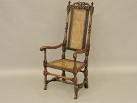 Lot 504 - A William and Mary walnut and oak caned elbow chair