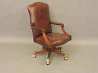 Lot 431 - A leather upholstered high back desk chair