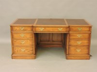 Lot 432 - An Arthur Brett oak pedestal desk