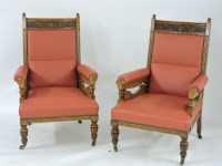 Lot 417 - A pair of late Victorian carved oak open armchairs