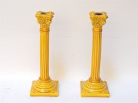 Lot 204A - A pair of Burmantofts yellow candlesticks