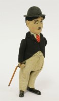 Lot 22 - A Schuco Charlie Chaplin tinplate clockwork figure