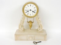 Lot 201 - A French white marble mantel clock