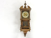 Lot 377 - An early 20th century German walnut wall clock