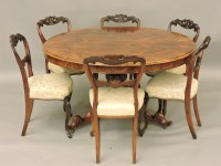 Lot 435 - A Victorian rosewood circular tilt top dining table