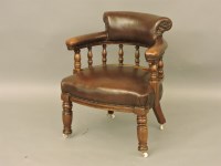 Lot 485 - A leather and walnut desk chair