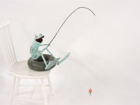 Lot 167 - A hand sculptured green patinated copper seated frog