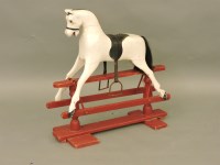 Lot 327 - A Victorian carved wooden rocking horse