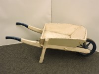 Lot 531 - An old wooden shop display wheel barrow