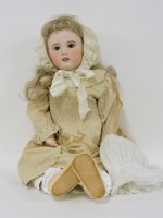 Lot 271 - A bisque head doll