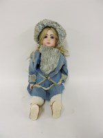 Lot 272 - A bisque head doll