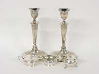 Lot 78 - A pair of silver Adam style candlesticks