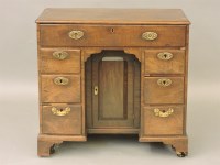 Lot 426 - A 19th century mahogany kneehole desk