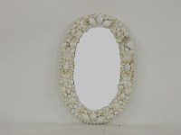 Lot 579 - A modern oval wall mirror