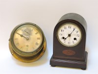 Lot 196 - A brass ship's bulkhead clock