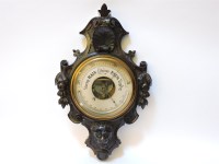 Lot 313 - A Victorian oak aneroid barometer/thermometer