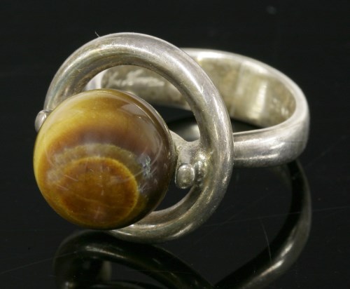 Lot 30 - A Danish sterling silver tiger's eye ring
