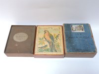 Lot 250 - Three boxed antique puzzles