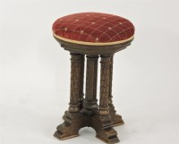 Lot 387 - An oak Gothic Revival adjustable music stool