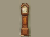 Lot 404 - A 19th century mahogany and oak longcase clock