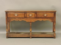 Lot 383 - A reproduction George III style oak dresser base