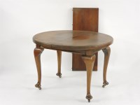 Lot 455 - A 1920s mahogany extending dining table