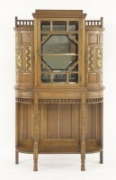 Lot 68 - An oak and parcel gilt side cabinet