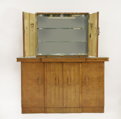 Lot 188 - An Art Deco maple cocktail cabinet