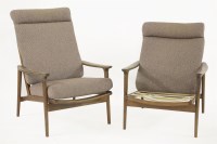 Lot 450 - A pair of Parker Knoll teak elbow chairs