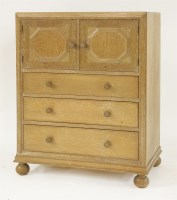 Lot 154 - An oak cupboard chest