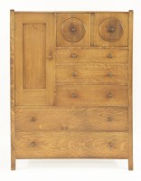 Lot 83 - An Heal's oak nursery cabinet
