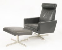 Lot 607 - A Danish black leather lounger and matching ottoman