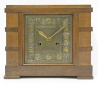 Lot 149 - An Art Deco oak-cased mantel clock