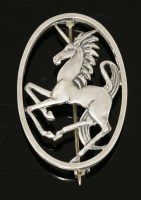 Lot 31 - A sterling silver unicorn brooch