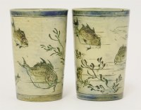 Lot 46 - Two Martin Brothers' stoneware beakers