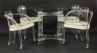 Lot 485 - A clear Lucite dining suite