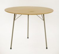 Lot 542 - A circular laminated and tubular dining table